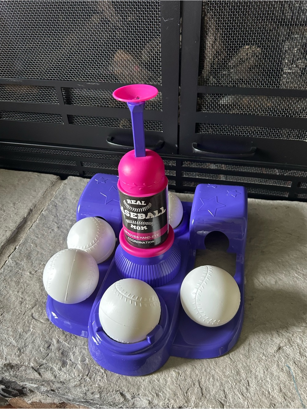 Purple and Pink T-Ball Toy with White Balls